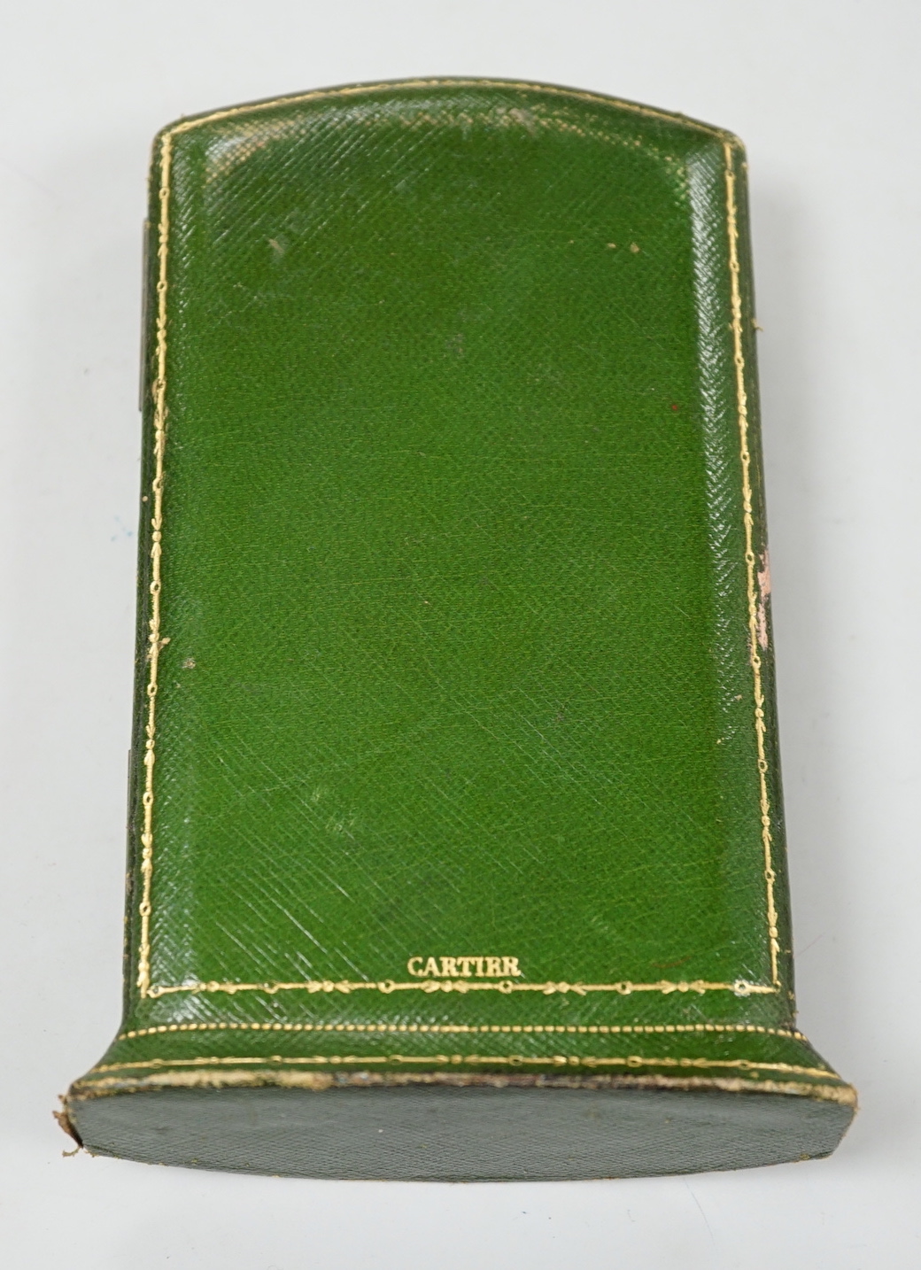 A 1920's? Cartier gilt tooled green leather free standing jewellery box, height 14.2cm